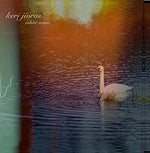 the album cover for Keri Jioras - White Swan
