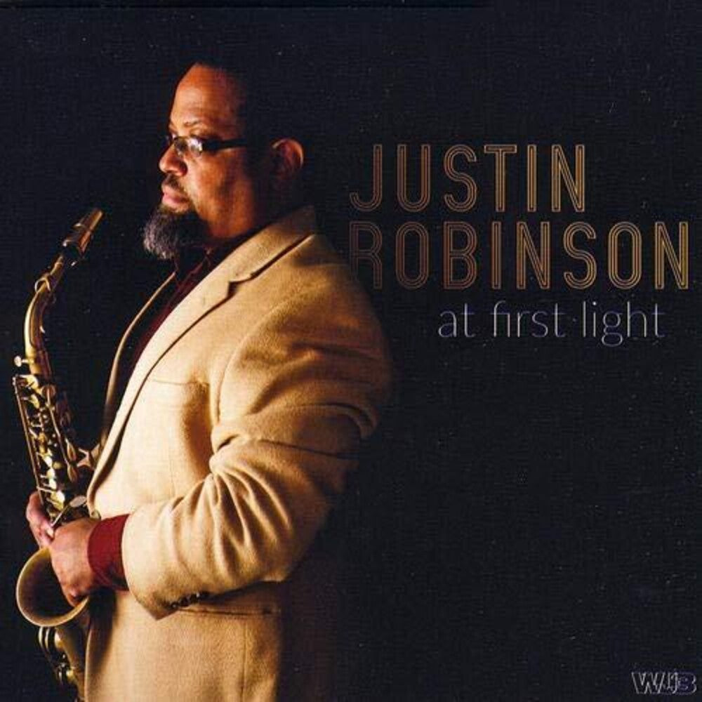 the album cover for Justin Robinson - At First Light