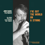 the album cover for John Mcneil - I've Got The World On A String