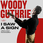 the album cover for Woody Guthrie - I Saw A Sign: 1940-1947 Recordings (W/Book) [Remastered]
