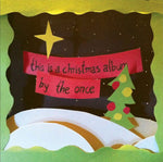 the album cover for Once - This Is A Christmas Album