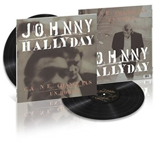 the album cover for Johnny Hallyday - Ca Ne Change Pas Un Homme