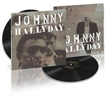 the album cover for Johnny Hallyday - Ca Ne Change Pas Un Homme