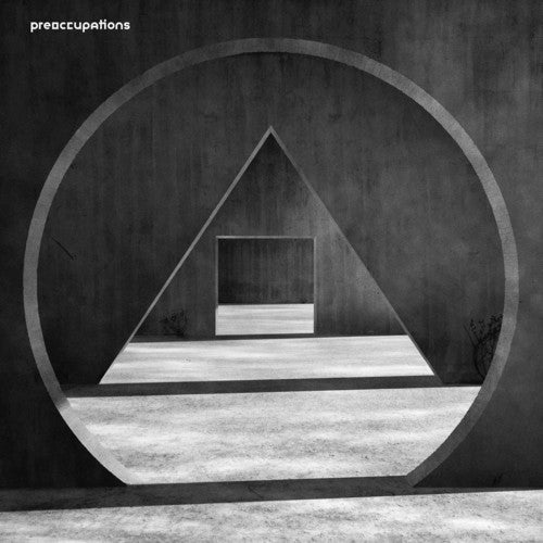 the album cover for Preoccupations - New Material [Indie Exclusive Limited Edition Colored LP]