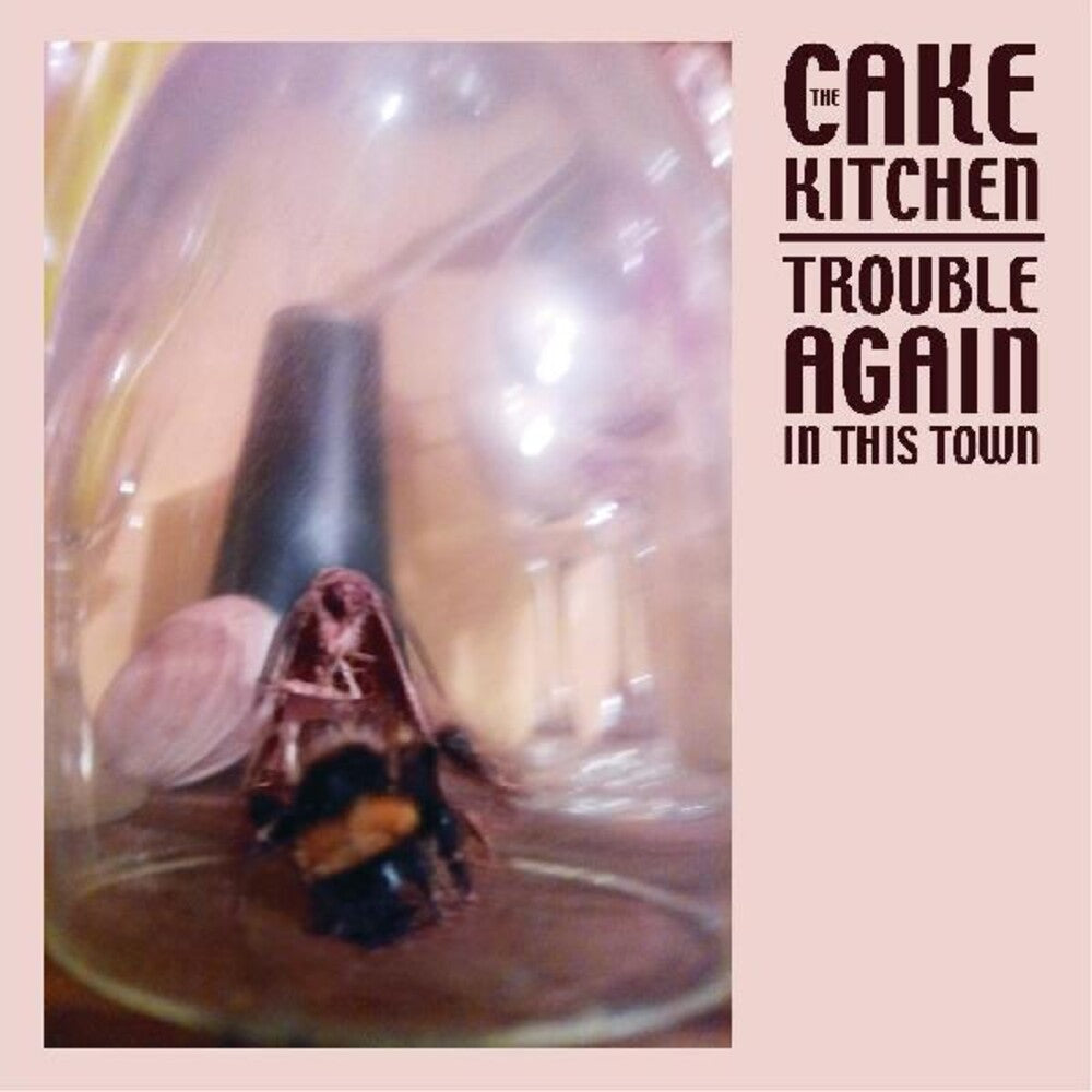 the album cover for Cakekitchen - Trouble Again In This Town
