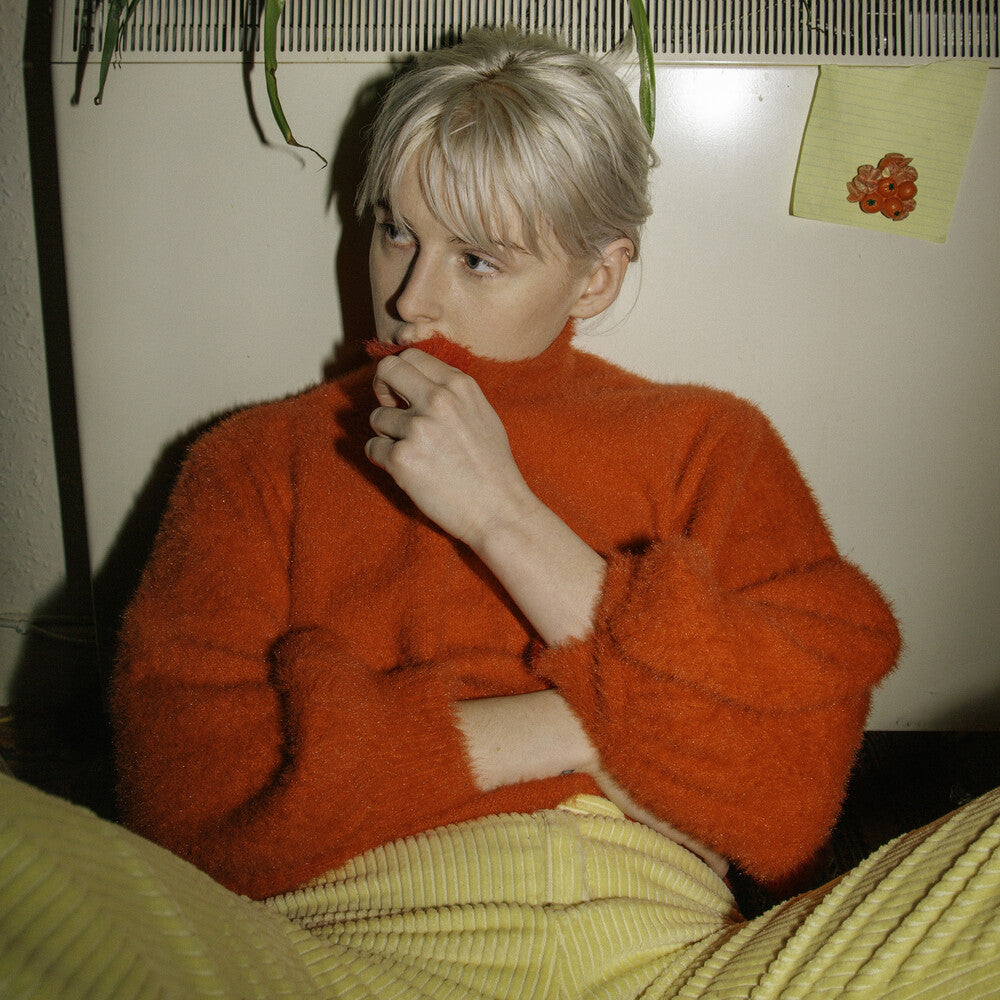 the album cover for Fenne Lily - Breach (Indie Exclusive) (Opaque Yellow)