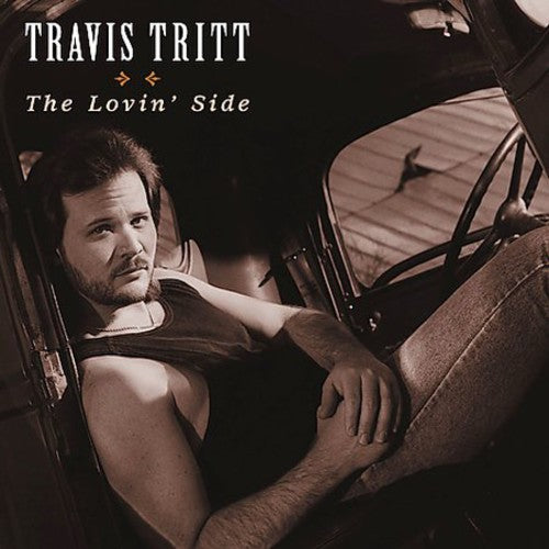 the album cover for Travis Tritt - The Lovin' Side