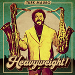 the album cover for Turk Mauro - Heavyweight