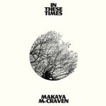 the album cover for Makaya McCraven - In These Times [Indie Exclusive Limited Edition Ivory LP]