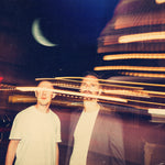 the album cover for Ant Law - Same Moon In The Same World