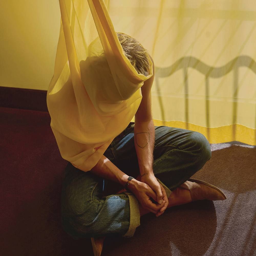 the album cover for Reuben and The Dark - In Lieu Of Light