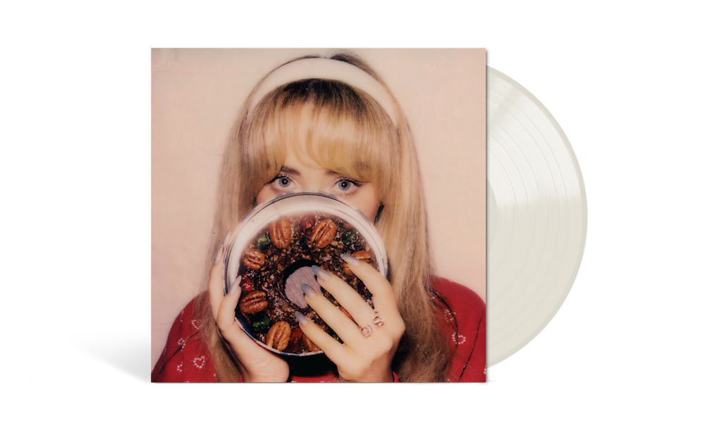 the album cover for Sabrina Carpenter - fruitcake [Milky Clear 12inch EP]