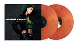 the album cover for Alicia Keys - Songs In A Minor - 25th Anniversary [Translucent Burnt Orange Marbled]