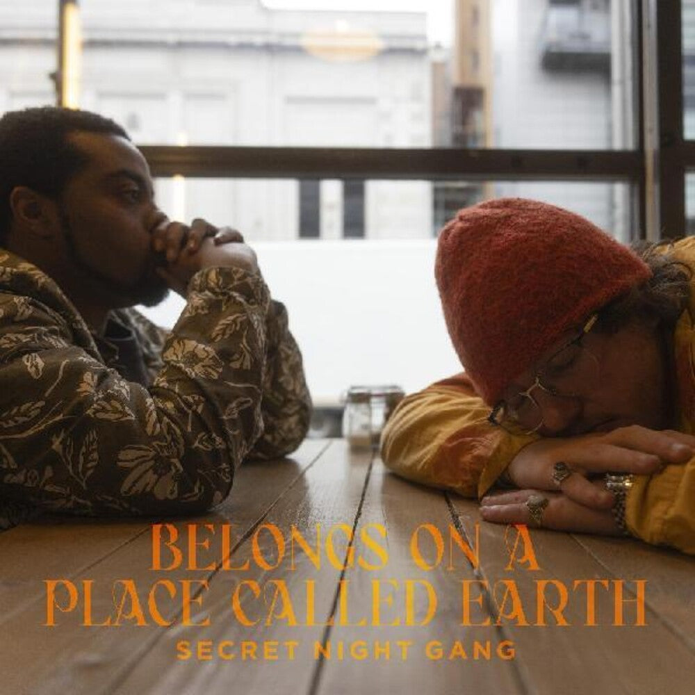 the album cover for Secret Night Gang - Belongs On A Place Called Earth