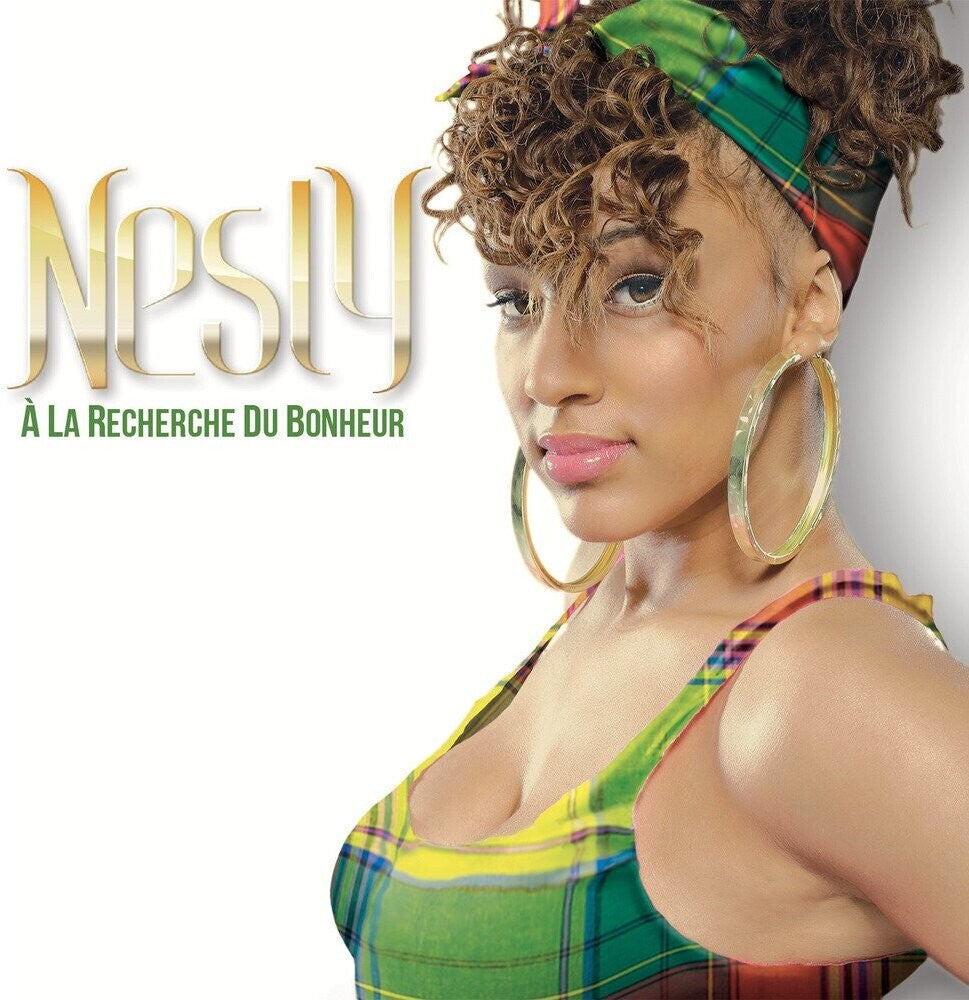 the album cover for Nesly - A La Recherche Du Bonheur [Digipak]