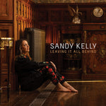 the album cover for Sandy Kelly - Leaving It All Behind (Uk)
