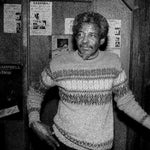 the album cover for Lazy Lester - All Over You: 25th Anniversary Edition [Indie Exclusive Limited Edition Orange & Blue Splatter LP]