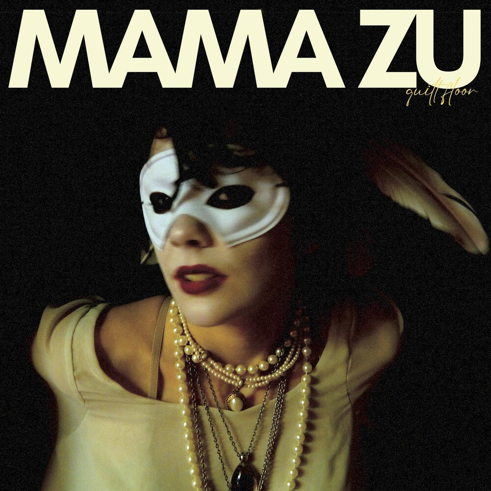 the album cover for Mama Zu - Quilt Floor [Coke Bottle Clear LP]