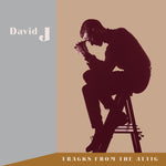 the album cover for David J - Tracks From The Attic (W/Cd) (Brwn) [Clear Vinyl]