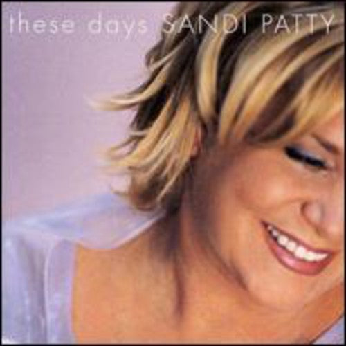 the album cover for Sandi Patty - These Days
