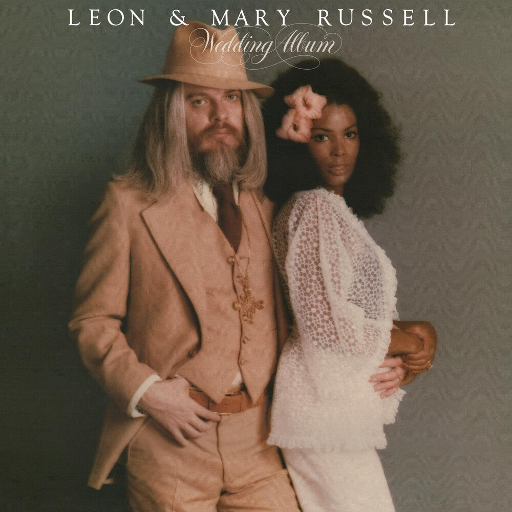 the album cover for Leon Russell - Wedding Album [Colored Vinyl] [Limited Edition] (Slv)
