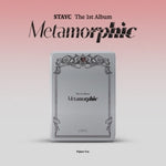 STAYC - Metamorphic - Figure Version - incl. Tin Case, Figurine, Selfie Photocard, Deco Sticker, Folded Poster + Mini-Photo Book (CD)