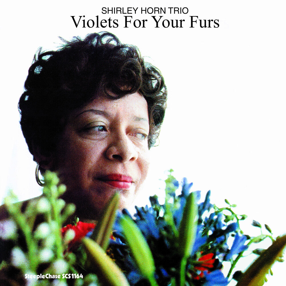 the album cover for Shirley Horn - Violets For Your Furs-180 Gram (Spa) [180 Gram]