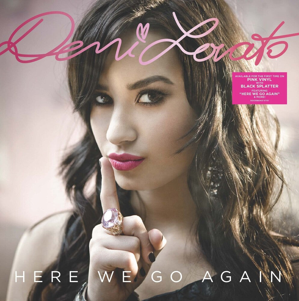 the album cover for Demi Lovato - Here We Go Again [Pink/Black Splatter LP]