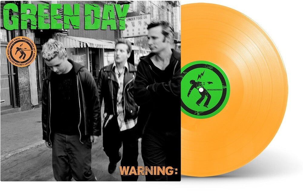 the album cover for Green Day - Warning (25th Anniversary Deluxe Edition) [Neon Orange LP]