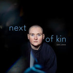 the album cover for Dani Larkin - Next Of Kin