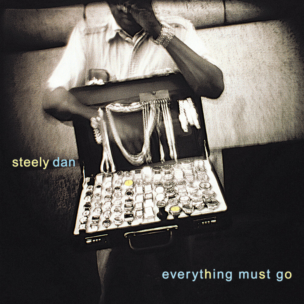 the album cover for Steely Dan - Everything Must Go [Clear Vinyl]
