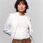 the album cover for Tori Amos - Strange Little Girls [Real Men Version]