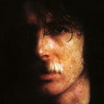 the album cover for Charly Garcia - Yendo De La Cama Al Living