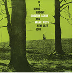 the album cover for Dorothy Ashby/ Wess,Frank - In A Minor Groove - Clear With Red/Green/Purple