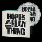 the album cover for Joy Oladokun - Hope Is A Heavy Thing