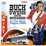 the album cover for Buck Owens& The Buckaroos - At The Mint: Vegas 1968