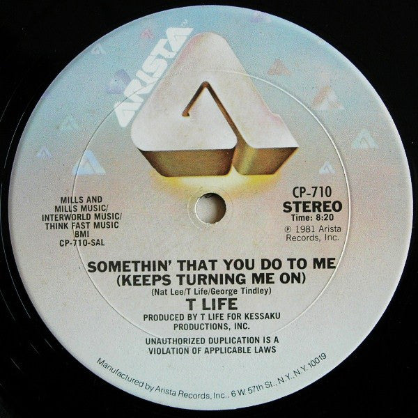 T Life* : Somethin' That You Do To Me (Keeps Turning Me On) (12", Pit)
