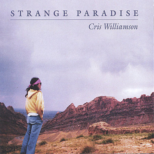 the album cover for Cris Williamson - Strange Paradise