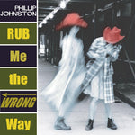 the album cover for Phillip Johnston - Rub Me the Wrong Way