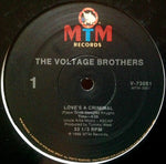 The Voltage Brothers : Love's A Criminal (12", Single)