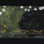 the album cover for Near Miss Mallet - Telephone to Girl in Glass Bathtub