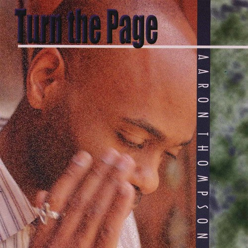 the album cover for Aaron Thompson - Turn the Page