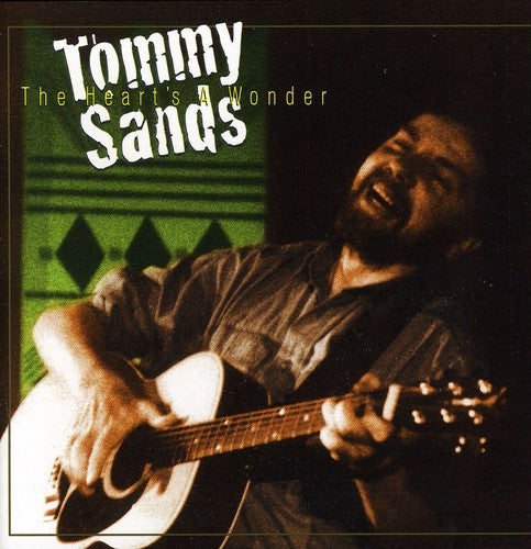 the album cover for Tommy Sands - Heart's a Wonder