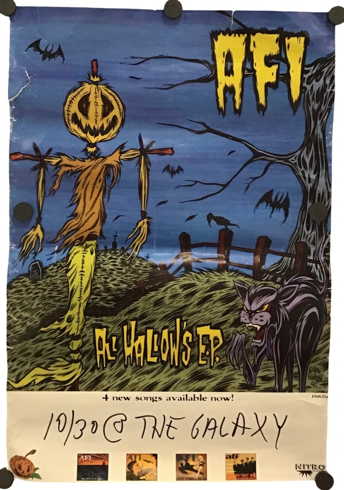 A hanging poster or print for AFI's 'All Hallow's EP' featuring a dark illustrated scene with a scarecrow-like figure, bats, a tree, and a wolf under a blue night sky, with the AFI logo in yellow at the top and album text at the bottom.