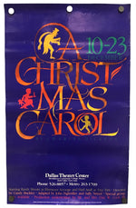 Vintage Dallas Theater Center Christmas Carol theatrical poster with a deep purple background and large stylized orange and gold lettering, plus green date text reading 10-23 December.