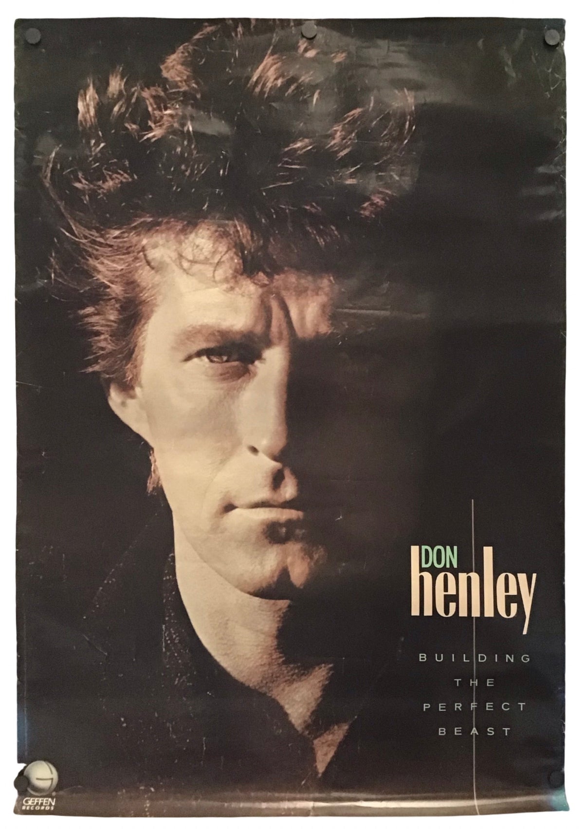 A vintage-style promotional poster for Don Henley, featuring a dramatic close-up portrait with the text 'DON henley' and 'BUILDING THE PERFECT BEASTY' on a dark background.