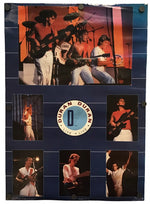 A vintage-style Dunan Dunan 'The Age of Love' poster or print featuring multiple photos of a band performing on stage, arranged on a dark blue background with a circular logo in the center.