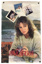 Vintage movie poster for the film 'High Season' featuring a woman in a knit sweater holding a camera, with three inset photos of people and red title text over a scenic outdoor background.