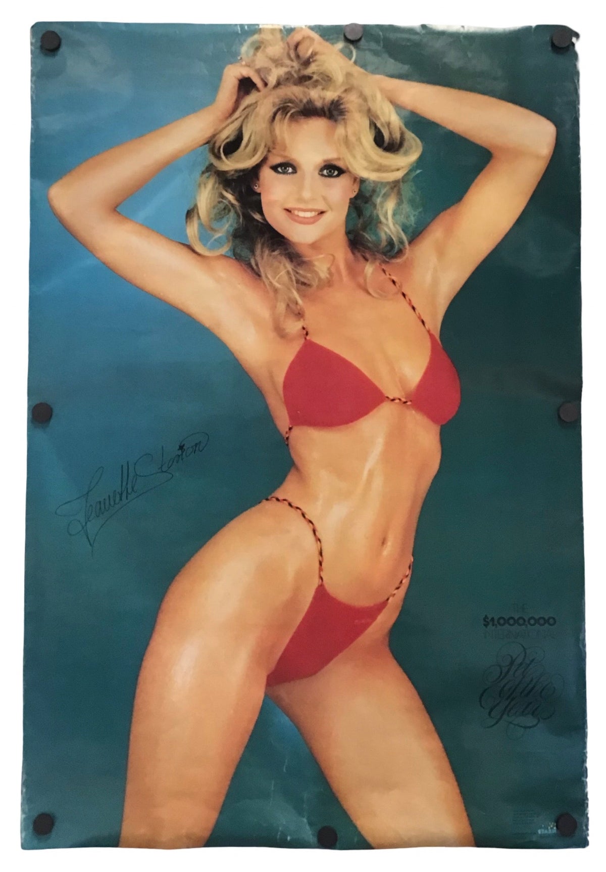 A vintage glossy poster featuring a blonde woman in a red bikini posing against a teal-blue background, with visible mounting holes in the corners and printed signatures.