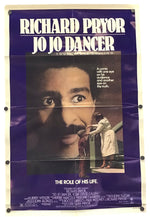 Vintage Jo Jo Dancer movie poster featuring Richard Pryor, with a purple background, large white title text, and a central close-up portrait of Richard Pryor.